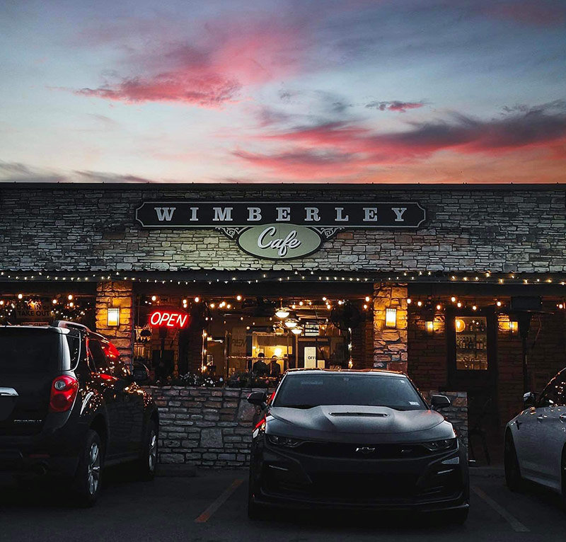 Wimberley Cafe, all alight, at sunset.