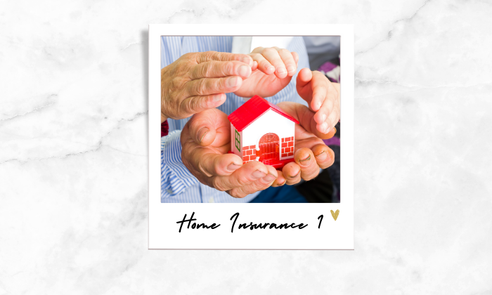 A photo of a house block covered by hands