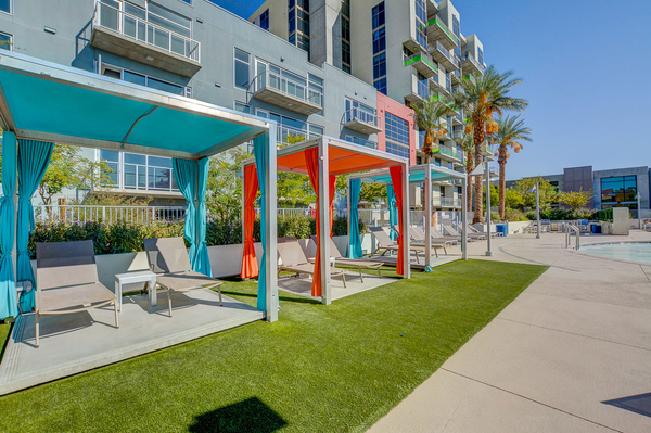 Poolside cabanas line the resort-style swimming pool at Juhl in downtown Las Vegas.