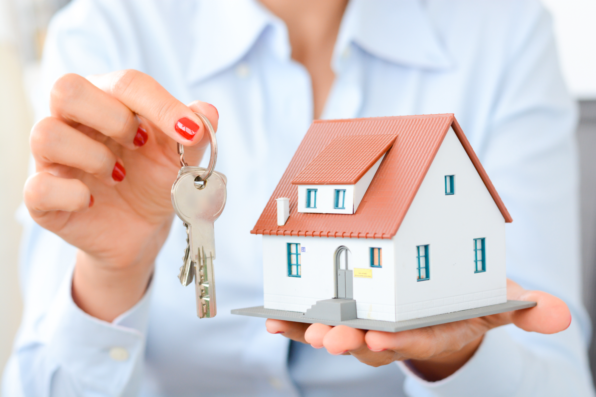 Buyer being handed keys to home