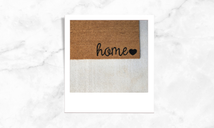 Photo of a welcome doormat 