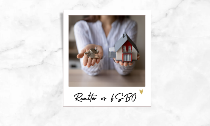 Photo of a woman showing keys and a house model