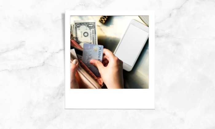 Photo of a person bringing out a credit card