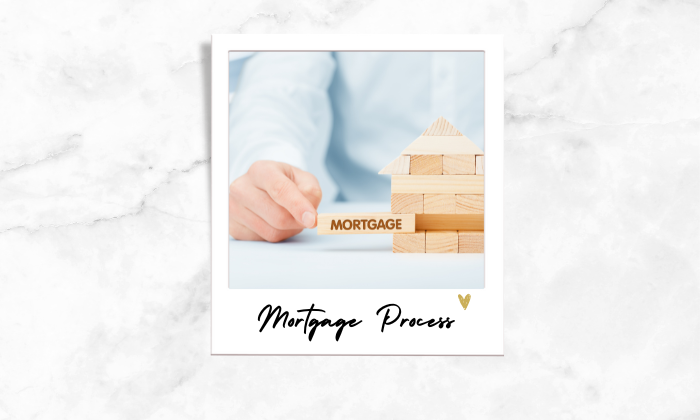 Photo of a person using wooden blocks to explain mortgage