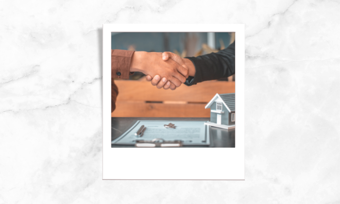 Photo of two people having a handshake