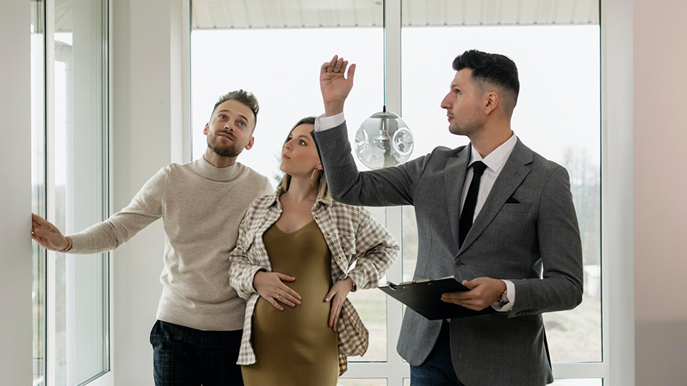 real estate agent showing a home