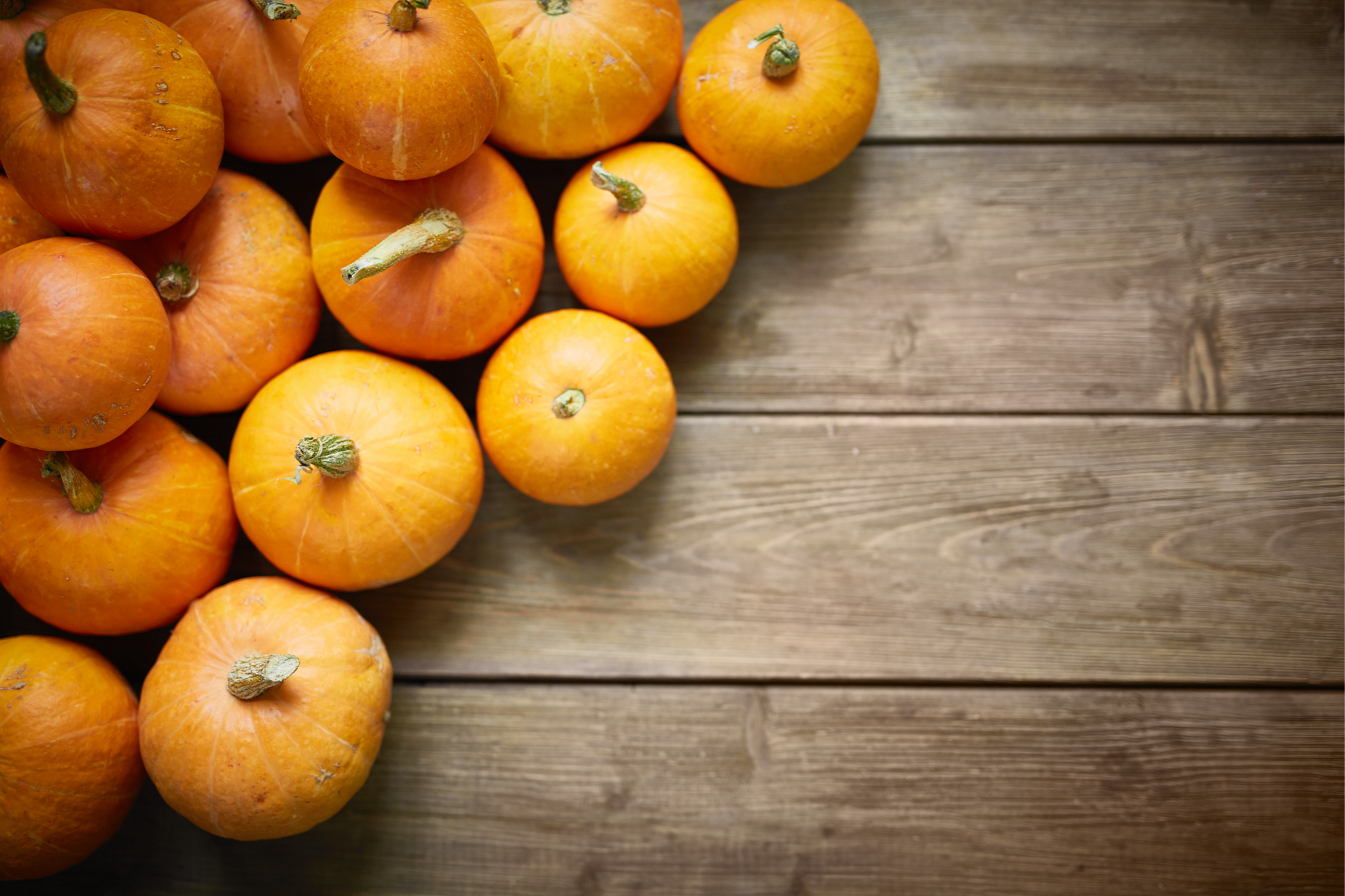 pumpkins on wooden table