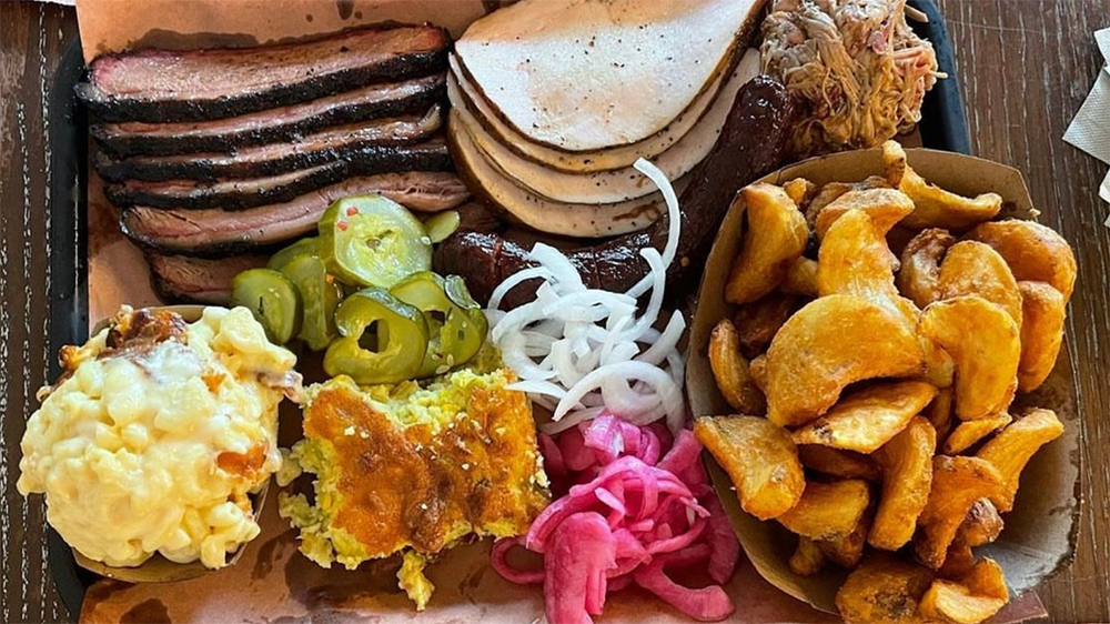 loaded platter of barbecue from lewis barbecue in charleston sc