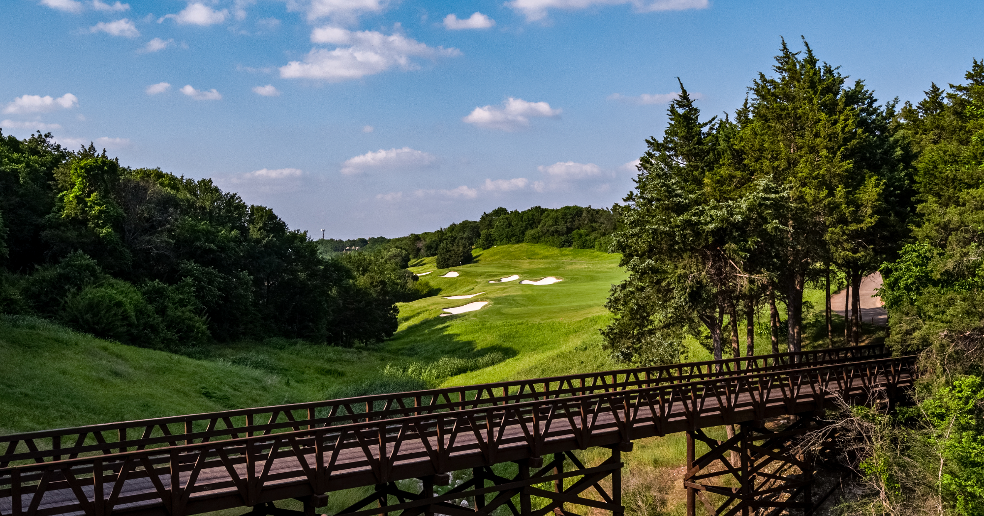Wooden bridge overlooking fairway