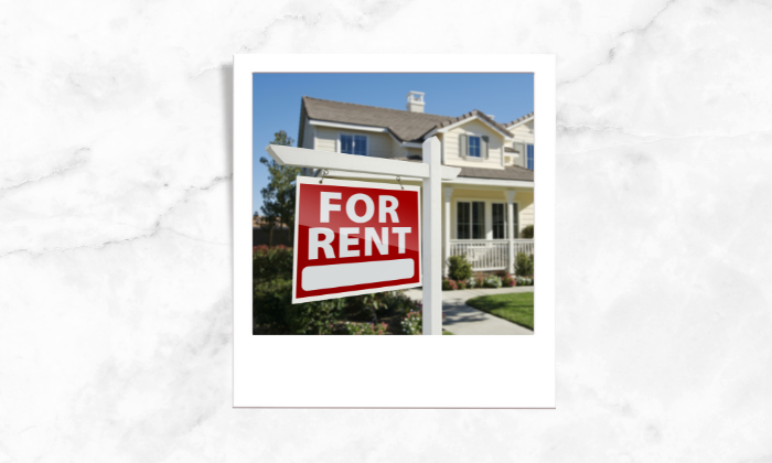 Photo of a house with a signage of "For Rent"