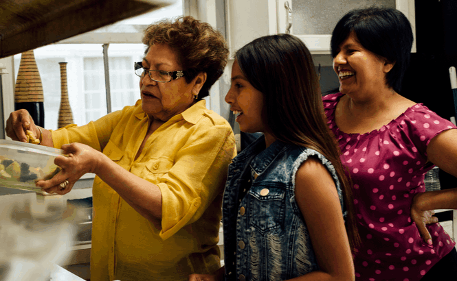 grandparent with child and mother