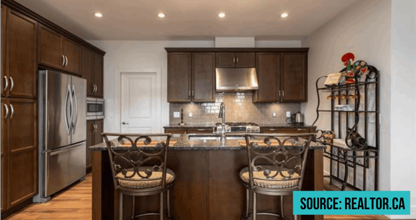 dark kitchen at a home in gablecraft kelowna