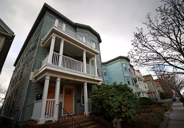 From banished to beloved: Triple-decker's Somerville.,James Lynch