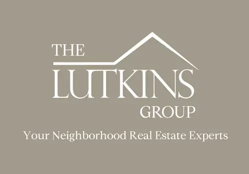 Your Neighborhood Real Estate Experts Logo - White on Brown