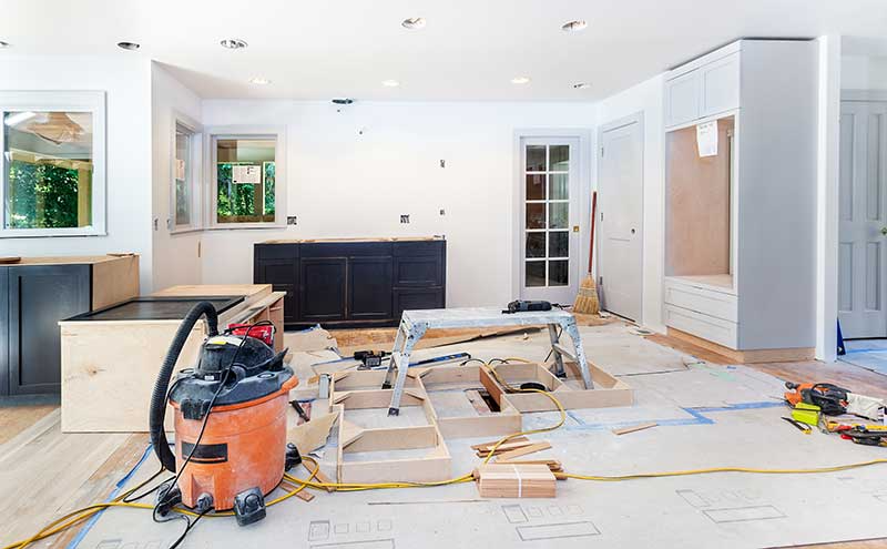 Modern kitchen in a Miami property featuring energy-efficient appliances, granite countertops, and a functional island, exemplifying kitchen upgrades that add value.when selling your home in miami