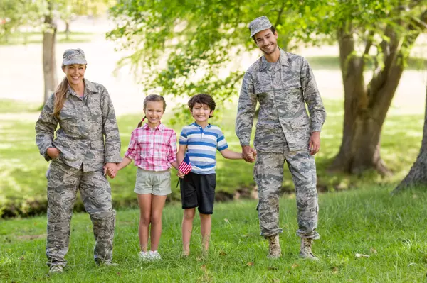 military-couple-with-their-kids-2021-08-28-17-24-01-utc