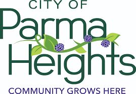 A white logo that reads in green letters "City of Parma Heights community grows here" located near homes for sale in Parma Heights Ohio