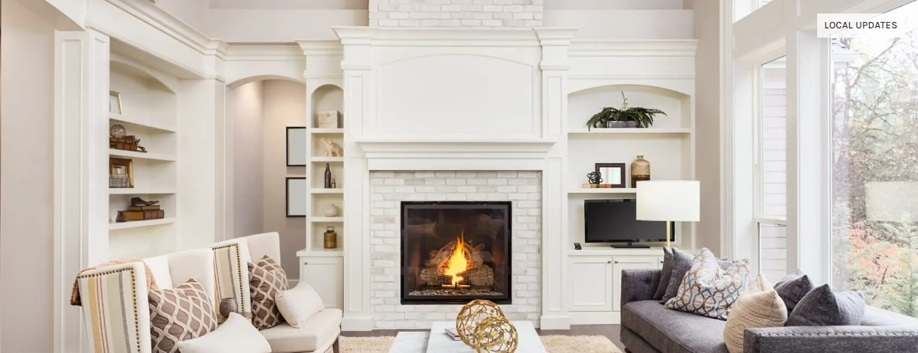 white living room with fireplace