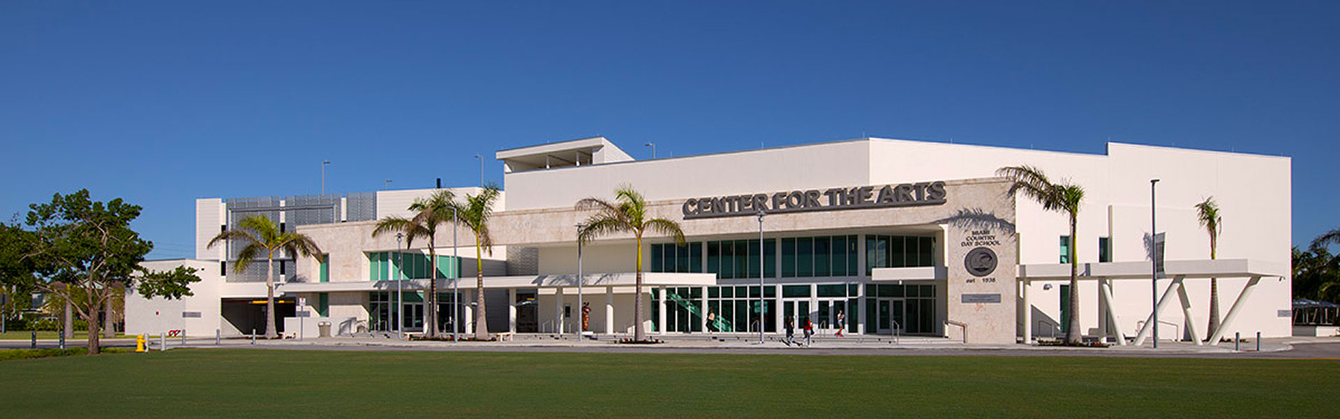 "Picture showing a montage of Miami's top schools and their vibrant neighborhoods, illustrating the blend of quality education and community life that each offers. Ideal visual guide for homebuyers with children looking for their perfect home in Miami."