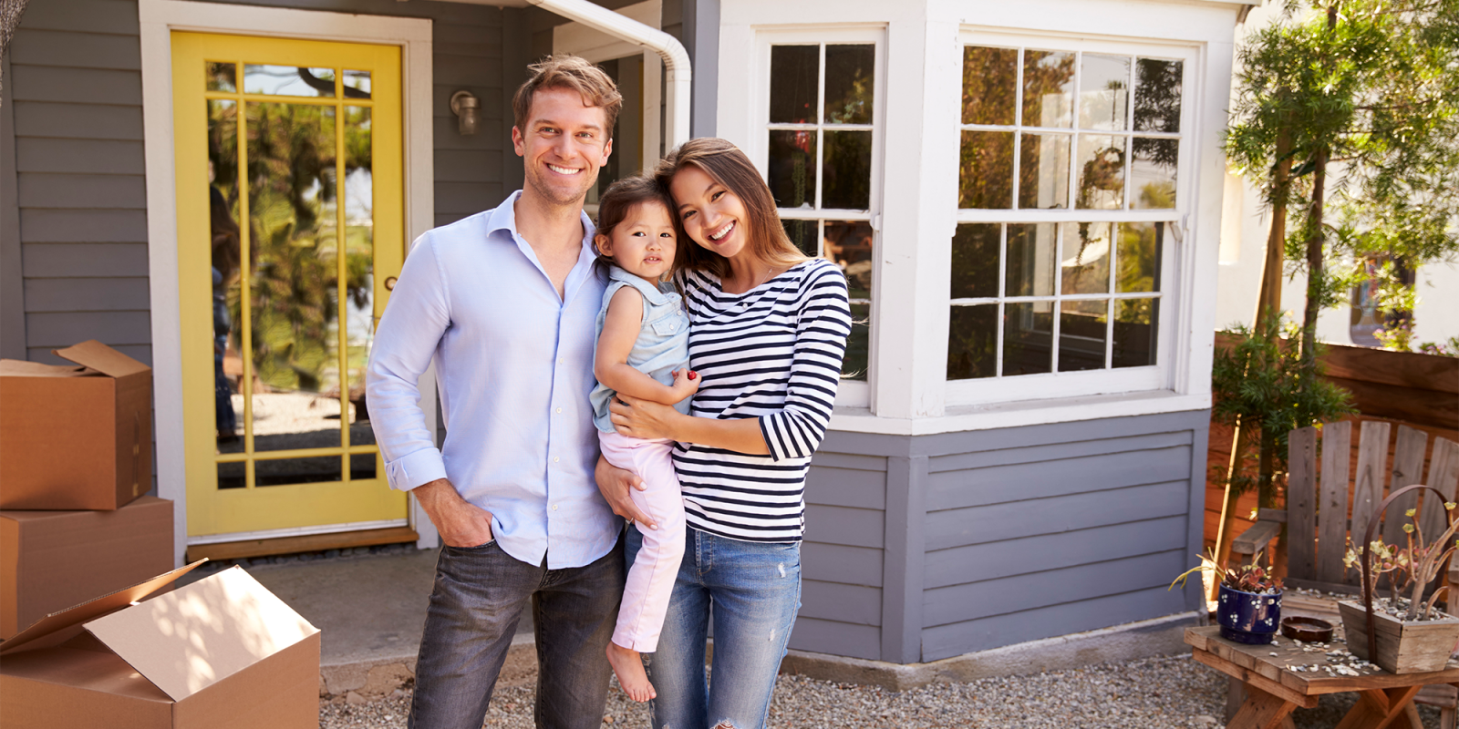 "First-time home buyer in Miami, reviewing comprehensive FAQ guide on home purchasing. This image depicts the navigation of the Miami real estate market, emphasizing the importance of being informed and prepared when buying a home in Miami."