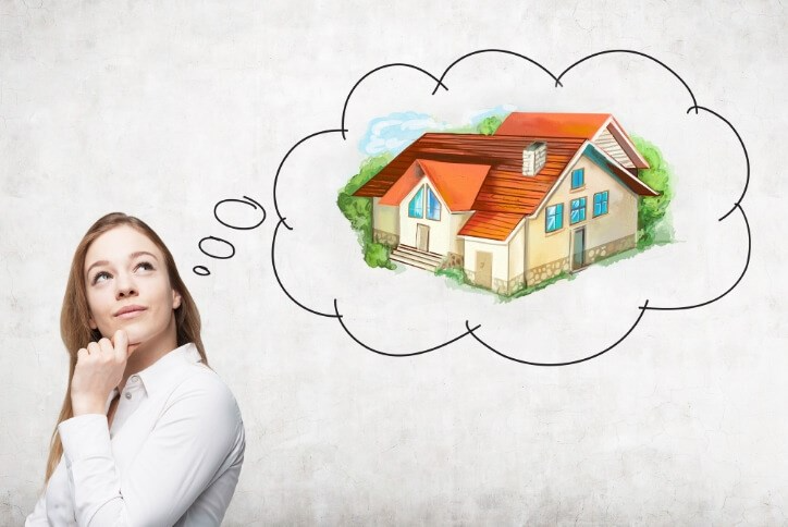 "A prospective Miami home buyer examining property listings, debunking common real estate myths."