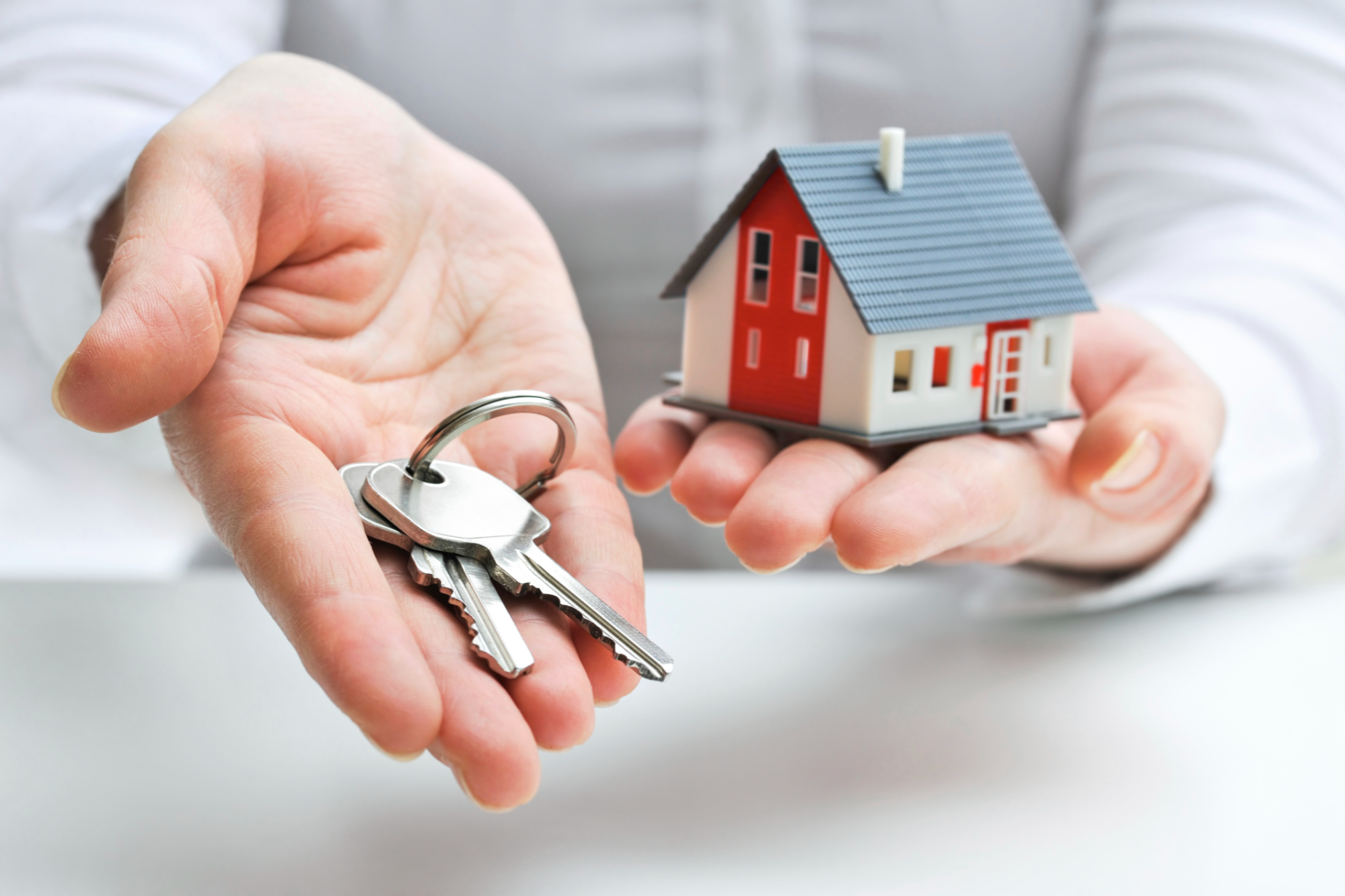 "First-time homebuyer in Miami carefully reviewing property documents, avoiding common mistakes during the home buying process to make a successful investment in the Miami real estate market."
