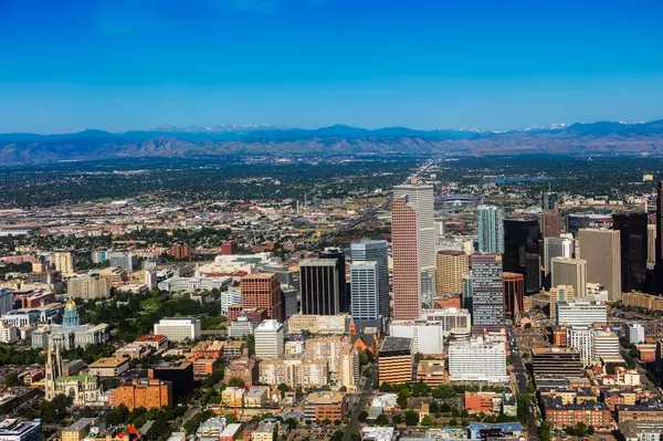 Investing in Denver Real Estate: Is It a Good Investment? ,Lewi & Mackenzie Gault