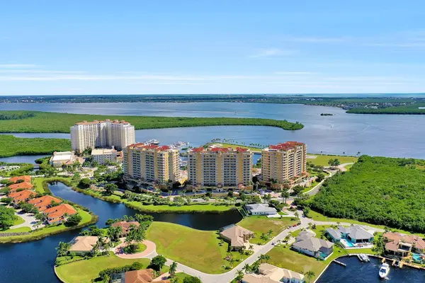 Tarpon Point Marina: Where Waterfront Living Meets Ultimate Luxury!,Billee Silva, PA, ABR SRS