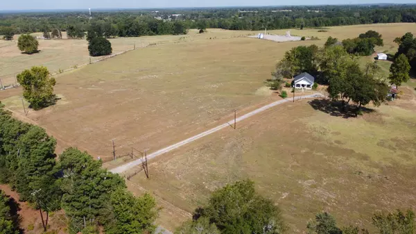 aerial view of road leading to ranch for sale near arp texas