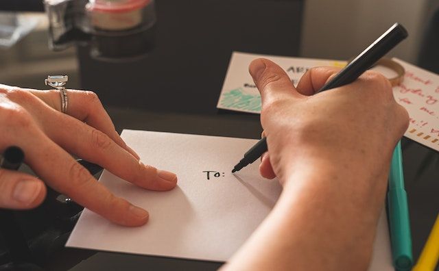  A person writing a letter