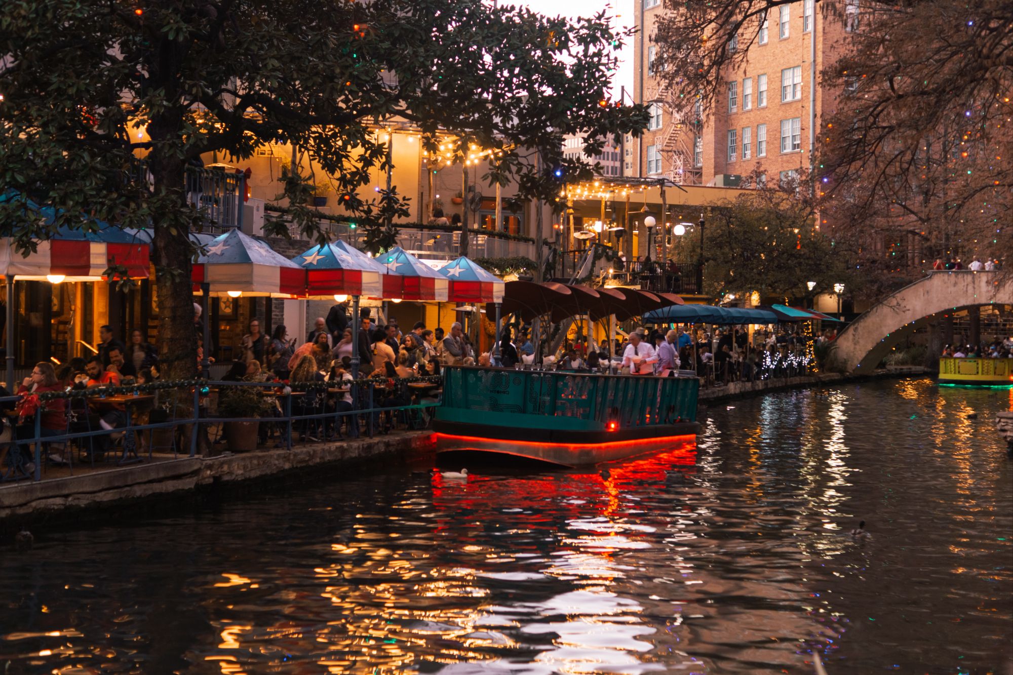 The boat floats down the river.