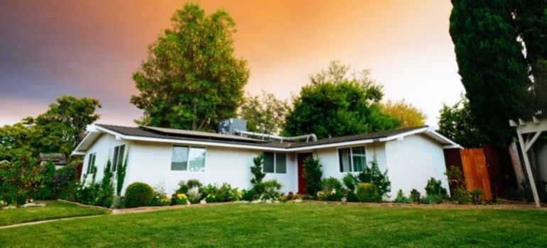The exterior of a house at sunset