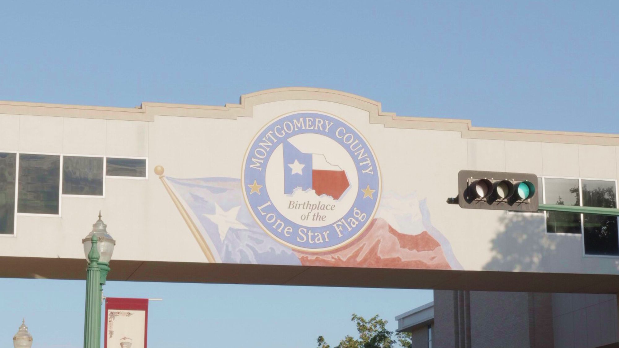 Conroe Texas Flag sign in Downtown Conroe