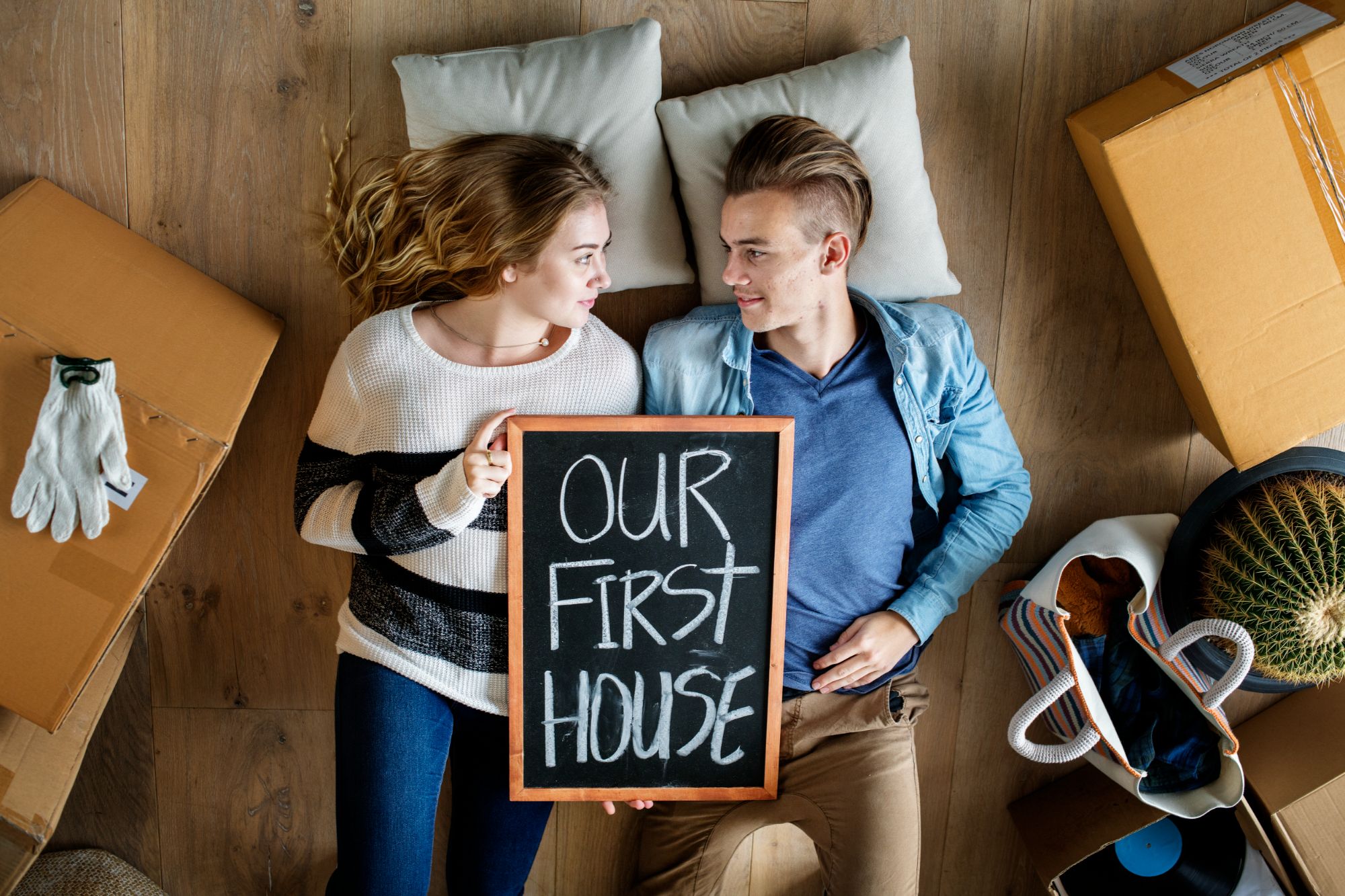 Couple relaxing in their new home