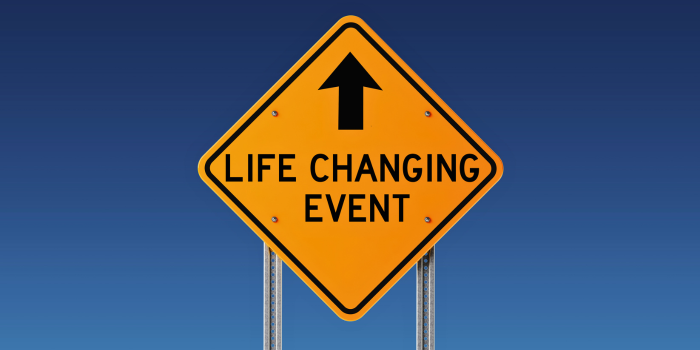 Yellow road sign with the words 'Life Changing Event' and an arrow pointing forward, symbolizing the impact of significant personal events on housing decisions. Emphasizes how life changes like marriage, job relocation, or retirement often drive real estate market trends more strongly than election outcomes.