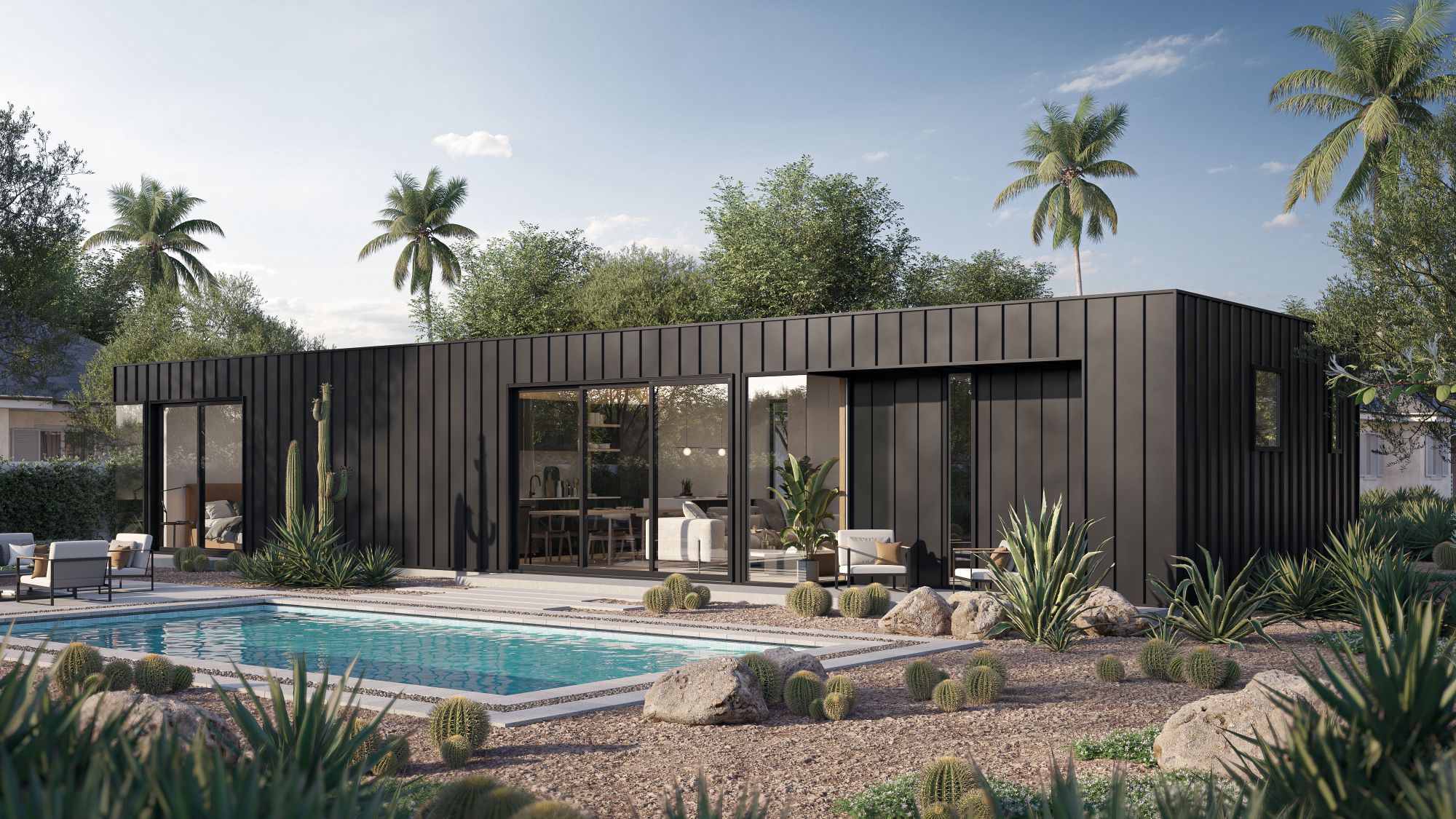 A modern rendering of an Accessory Dwelling Unit (ADU) in Arizona, featuring a sleek, black metal exterior. The ADU is surrounded by desert landscaping, including cacti, agave plants, and stones. In front of the ADU is a pool with lounge chairs, and the backdrop includes palm trees and a clear blue sky, evoking a serene desert environment.