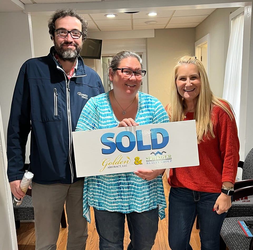 Kelly Stipa with Happy Home Buyers at Closing