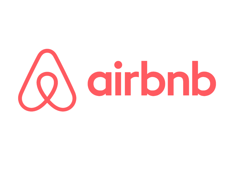 Airbnb logo in coral pink, symbolizing one of the leading platforms for vacation rental listings and a vital tool for building a strong online presence in the short-term rental market.