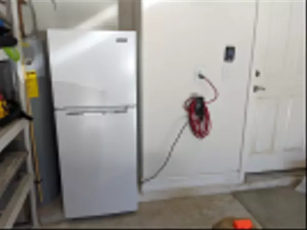 feature image of Does a Garage Refrigerator Go with the Seller or Stay for the Buyer?