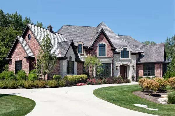 Large brick home with circular driveway (1)