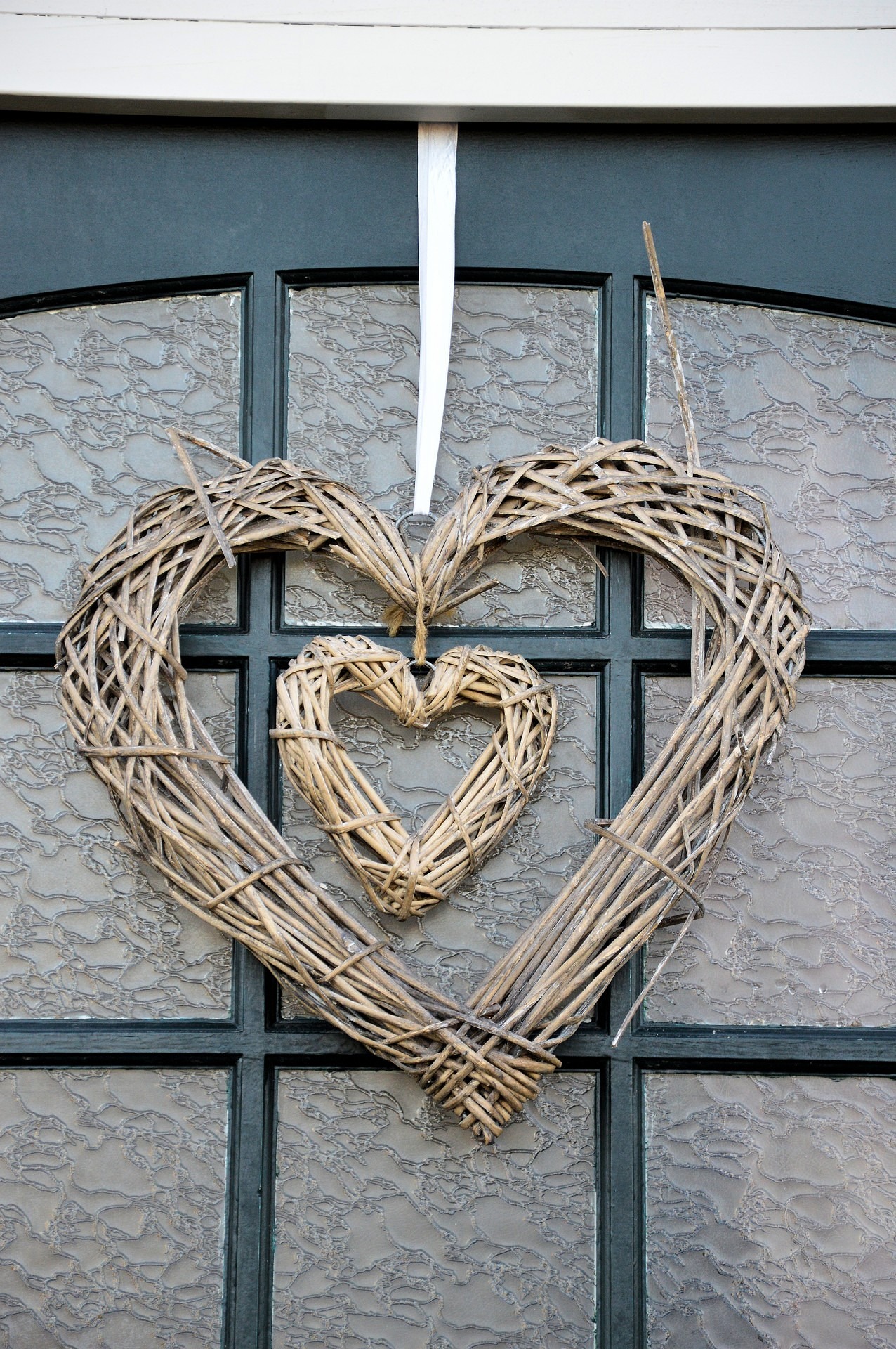Heart wreaths on blue door