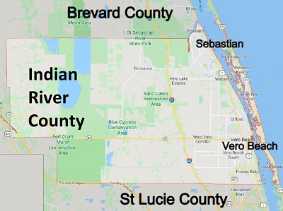 Winter Springs/Titusville Area with an entrance gate and palm trees, aspect ratio 3:2
