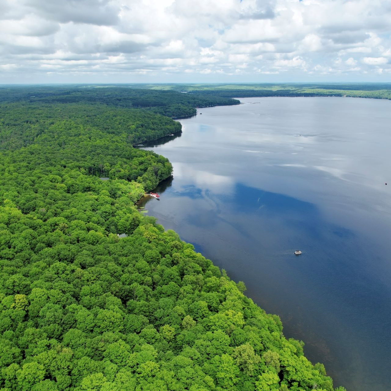 Drone photograph of Big Sand Lake and the shoreline along Eagles Nest in Poh-wah-gom Passage, Phelps, WI