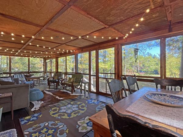 Screened porches provide some the best seats in a northwoods cabin! We'll be sure to highlight it in our marketing - Eliason Realty