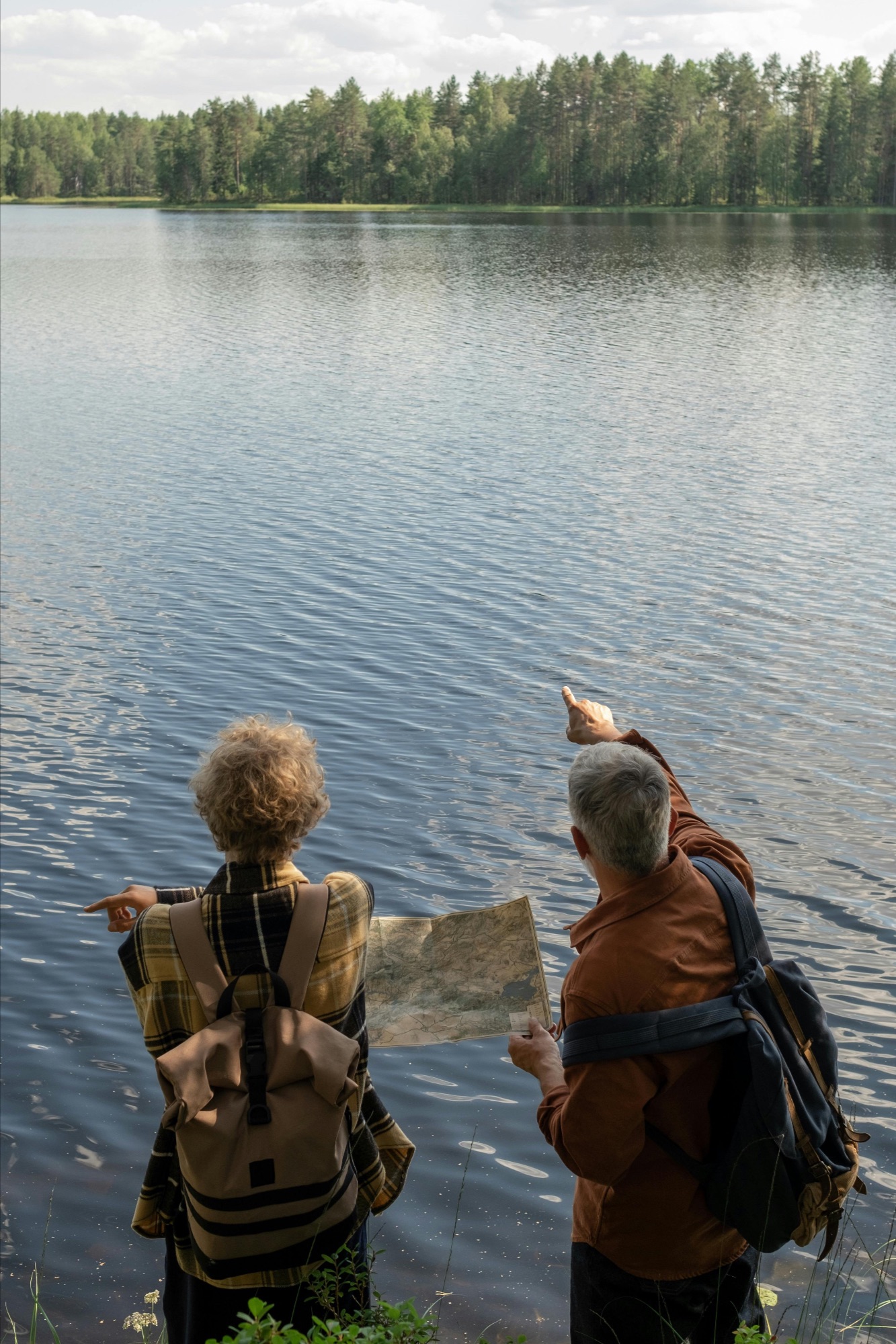 Hikers at an alpine lake near Banff, Alberta