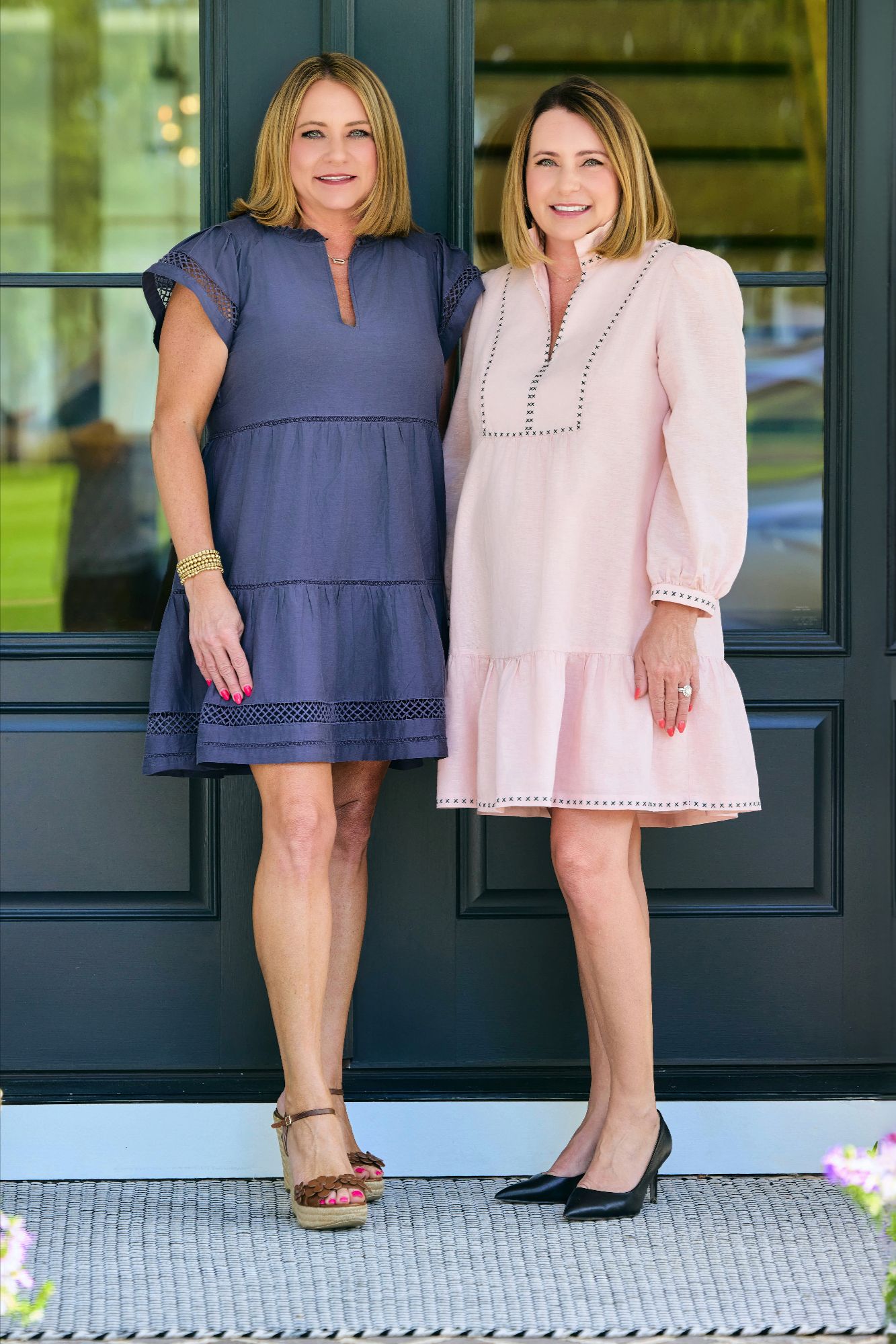 Tiffiney Graham and her sister, Tara, smiling together as a dynamic real estate team in Columbus, GA, dedicated to providing personalized service and seamless experiences for buyers, sellers, and investors. Offering real estate services in Georgia and Alabama.