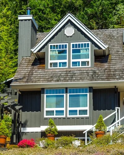 House in Powell with white garage doors