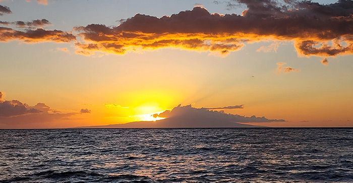 View of sunset over Lanai, Hawaii.