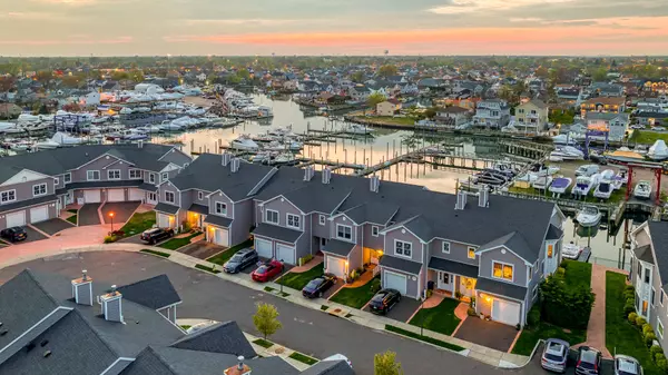 Embrace the Luxury of a Gated Waterfront Community with a Marina: The Perfect Retreat for Empty Nesters,Mark Stempel