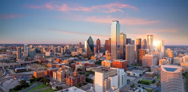 Dallas, Texas cityscape with blue sky at sunset (2)